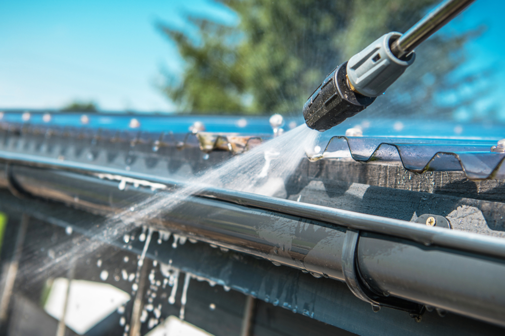 Cleaning Gutters with Pressure Washer