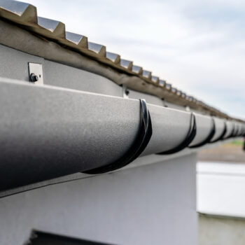 Close Up View of Gutters and Metal Roof