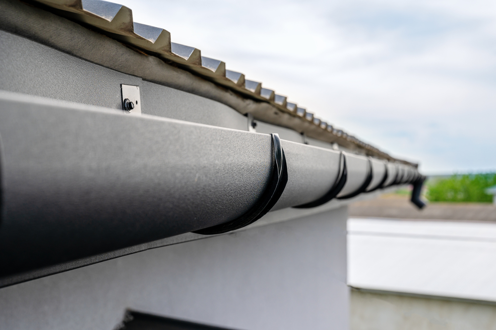 Close Up View of Gutters and Metal Roof