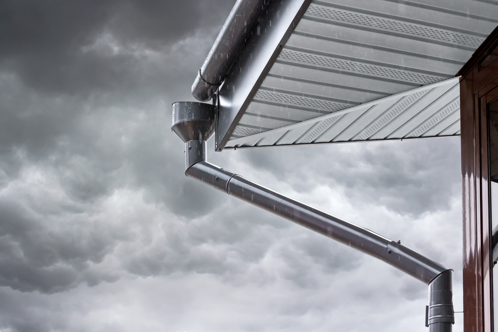 Gutters From Below with Gray Clouds Above